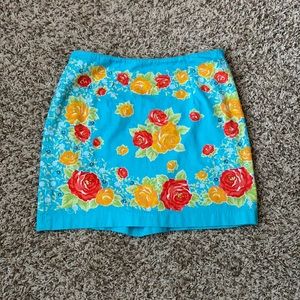 Express blue fitted mini skirt with floral print size 5/6
